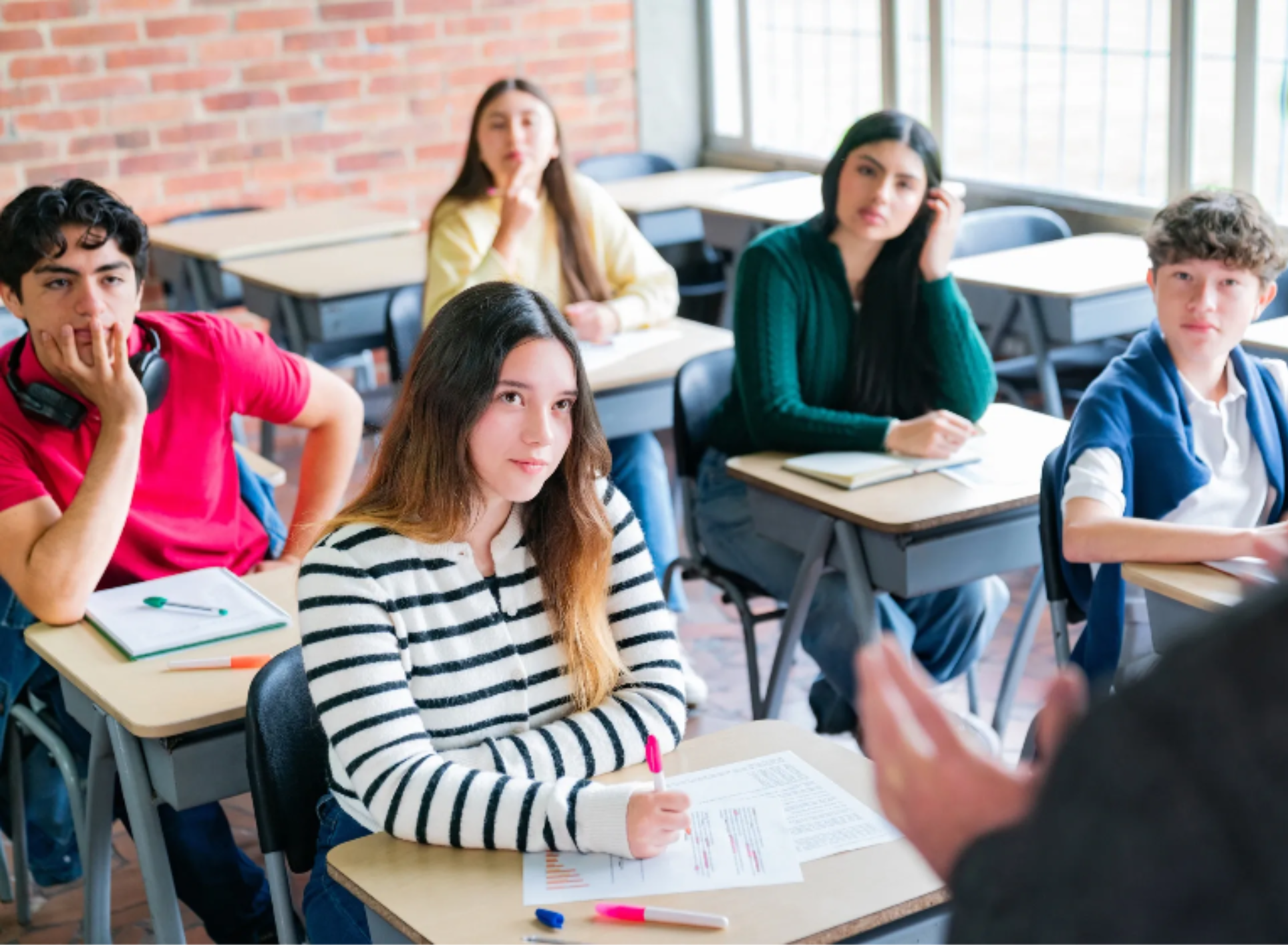 Students listening to a speaker